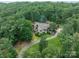 Beautiful custom home with sprawling green lawn at 3587 Ridgetop Rd, Sherrills Ford, NC 28673