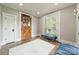 Bright foyer with hardwood floors, white trim, a wooden door, and access to an outdoor balcony at 3587 Ridgetop Rd, Sherrills Ford, NC 28673