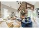 Inviting living room with a stone fireplace, vaulted ceiling, and comfortable seating for relaxation and entertainment at 3587 Ridgetop Rd, Sherrills Ford, NC 28673