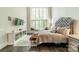Inviting main bedroom with a large window seat, providing a serene and relaxing retreat at 3587 Ridgetop Rd, Sherrills Ford, NC 28673