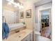 Well-lit bathroom with a vanity and a view to the office room at 408 Johnsfield Rd, Shelby, NC 28150