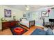 bedroom featuring hardwood floors, ceiling fan, and a study area at 408 Johnsfield Rd, Shelby, NC 28150