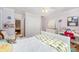 Inviting bedroom with wood floors, closet, and view into an adjoining bedroom at 408 Johnsfield Rd, Shelby, NC 28150