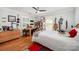 Comfortable bedroom with hardwood floors, natural light, and a ceiling fan at 408 Johnsfield Rd, Shelby, NC 28150