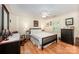 Bright bedroom with hardwood floors, neutral tones, and a ceiling fan at 408 Johnsfield Rd, Shelby, NC 28150