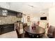 Elegant dining area featuring dark wood cabinets and view into the living room at 408 Johnsfield Rd, Shelby, NC 28150