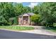 Beautiful brick home boasts mature landscaping and a welcoming front entrance at 408 Johnsfield Rd, Shelby, NC 28150