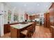 Beautiful kitchen features granite counters, stainless appliances, and an island with seating at 408 Johnsfield Rd, Shelby, NC 28150