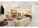 Comfortable living room featuring a stone fireplace and an open dining area at 408 Johnsfield Rd, Shelby, NC 28150