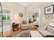Sitting room with views into the bathroom and bedroom; features hardwood floors and decorative rug at 408 Johnsfield Rd, Shelby, NC 28150