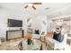 Open-concept living space with hardwood floors, comfortable seating, and seamless flow to the kitchen at 4226 Acorn St, Charlotte, NC 28205