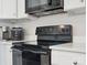 Close-up of a black oven inside the kitchen at 429 Summer Ridge Dr, Stanley, NC 28164