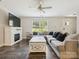 Cozy living room featuring a fireplace and hardwood floors at 429 Summer Ridge Dr, Stanley, NC 28164