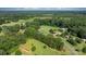 Expansive view of a beautiful home with a yard and surrounding green landscape at 4395 Burton Rd, Maiden, NC 28650