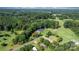 Picturesque home with fenced yard, mature trees, and scenic surroundings at 4395 Burton Rd, Maiden, NC 28650