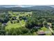 Serene aerial view showcases a home nestled within a lush, green countryside at 4395 Burton Rd, Maiden, NC 28650