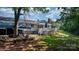 Expansive backyard features a large deck with white railings and a lush lawn at 4395 Burton Rd, Maiden, NC 28650