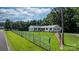 Beautiful ranch-style home with a well-manicured lawn and an American flag on display at 4395 Burton Rd, Maiden, NC 28650