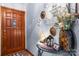 Warm foyer with elegant wood door, stylish decor, and welcoming ambiance at 4395 Burton Rd, Maiden, NC 28650