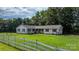 Inviting one-story home with a lovely front lawn and traditional architectural details at 4395 Burton Rd, Maiden, NC 28650