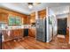Functional kitchen with wood cabinets, modern appliances, and ample counter space at 4395 Burton Rd, Maiden, NC 28650