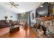 Inviting living room with a cozy stone fireplace and comfortable seating at 4395 Burton Rd, Maiden, NC 28650