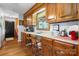Charming office nook featuring wooden cabinetry and a countertop workspace, with natural light at 4395 Burton Rd, Maiden, NC 28650