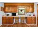 Charming office nook featuring wooden cabinetry and a countertop workspace, perfect for organization at 4395 Burton Rd, Maiden, NC 28650