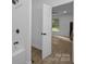 Bathroom with a soaking tub and entrance to an additional bedroom at 442 Lovelace Rd, Rock Hill, SC 29730