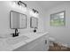 Updated bathroom with double vanity, marble countertop, and modern black fixtures at 442 Lovelace Rd, Rock Hill, SC 29730