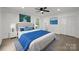 This bedroom features a neutral palette, wood-look floors, and a ceiling fan at 442 Lovelace Rd, Rock Hill, SC 29730