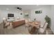 Open-concept living and dining area, featuring modern furnishings, neutral tones, and stylish decor at 442 Lovelace Rd, Rock Hill, SC 29730