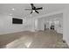 Open-concept living space with wood-look flooring, recessed lighting, and seamlessly connected to a modern kitchen at 442 Lovelace Rd, Rock Hill, SC 29730