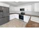 Kitchen featuring stainless steel appliances and white cabinetry at 4550 Briarcreek Rd, Maiden, NC 28650