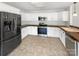 Modern kitchen with stainless steel appliances, white cabinets, and countertop space at 4550 Briarcreek Rd, Maiden, NC 28650