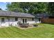 Backyard with patio, table and chairs at 5329 Valley Forge Rd, Charlotte, NC 28210