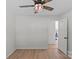 Bedroom featuring light walls, hard wood floors and door at 5329 Valley Forge Rd, Charlotte, NC 28210