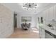 Well-lit kitchen with stainless steel appliances, breakfast nook, and access to backyard at 5329 Valley Forge Rd, Charlotte, NC 28210