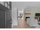 Inviting living room with a fireplace, hardwood floors, and an open floor plan at 5329 Valley Forge Rd, Charlotte, NC 28210