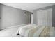 Neutral bedroom with carpet, closet, and a minimalist design at 656 Ne Camrose Ne Cir, Concord, NC 28025