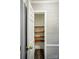 A closet with multiple shelves for maximum storage at 656 Ne Camrose Ne Cir, Concord, NC 28025