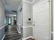 Inviting home entryway with wood-look floors leading to a spacious living area at 656 Ne Camrose Ne Cir, Concord, NC 28025