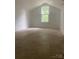 Bedroom with vaulted ceilings and one window at 659 Annafrel St, Rock Hill, SC 29730