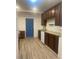Well-lit kitchen with granite countertops, dark cabinets, and modern appliances at 659 Annafrel St, Rock Hill, SC 29730