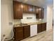 Well-lit kitchen with granite countertops, dark cabinets, and modern appliances at 659 Annafrel St, Rock Hill, SC 29730