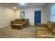 Inviting living room with neutral walls, new floors, and comfortable furniture for relaxing at 659 Annafrel St, Rock Hill, SC 29730