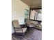 Inviting front porch with comfortable rocking chairs, a patterned outdoor rug, and natural light at 659 Annafrel St, Rock Hill, SC 29730
