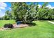 Entrance to a neighborhood park with beautiful trees and landscaping at 6705 Reddman Rd, Charlotte, NC 28212