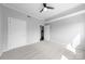 Bright bedroom with neutral carpet and an open layout at 715 N Church St # 513, Charlotte, NC 28202