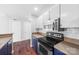 Charming kitchen features stainless steel appliances, sleek cabinetry, and a modern tile backsplash at 715 N Church St # 513, Charlotte, NC 28202